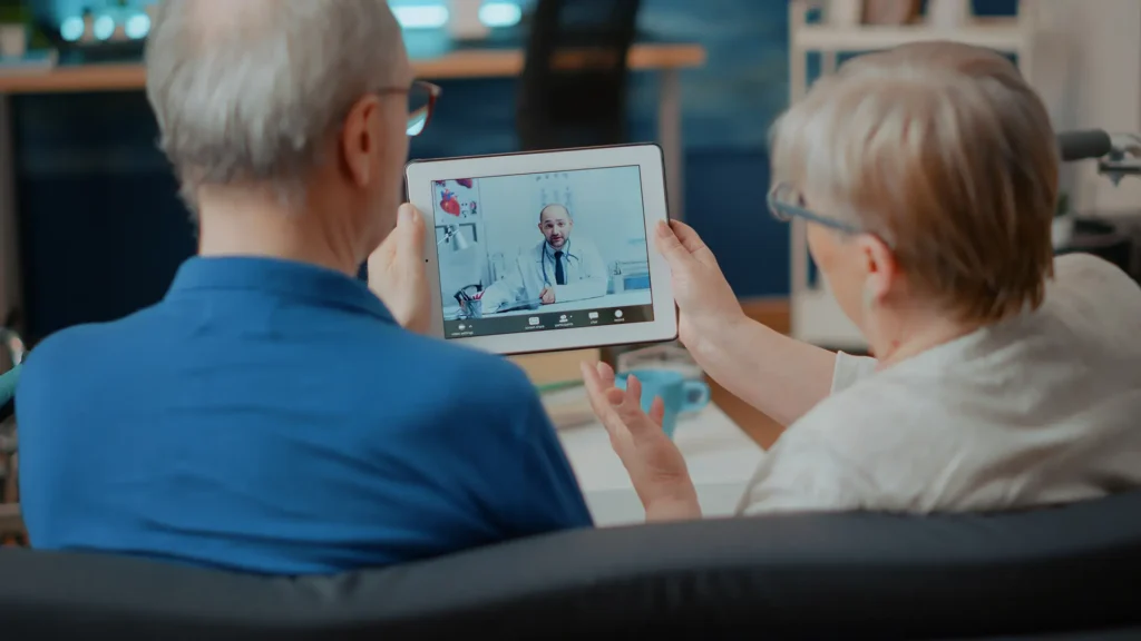 Attending an online meeting with a remote doctor using video conferencing